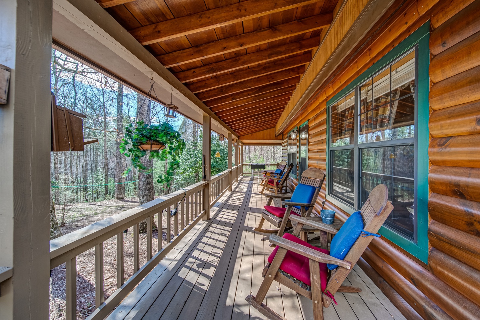Enjoy morning coffee out on the covered porch with comfortable rocking chairs or watch the kids play in this home's huge yard