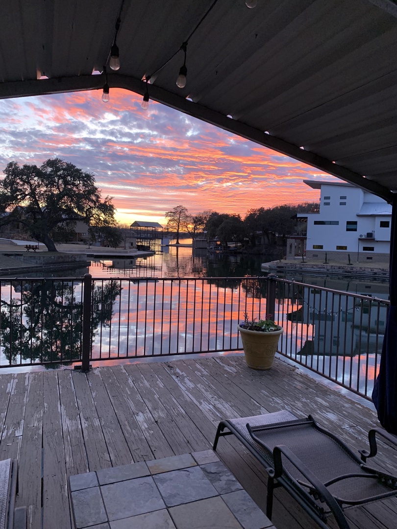 Enjoy stunning sunsets from the covered deck