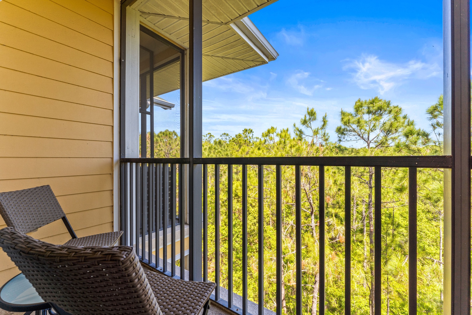 Enjoy morning coffee or dine alfresco on the breezy screened balcony