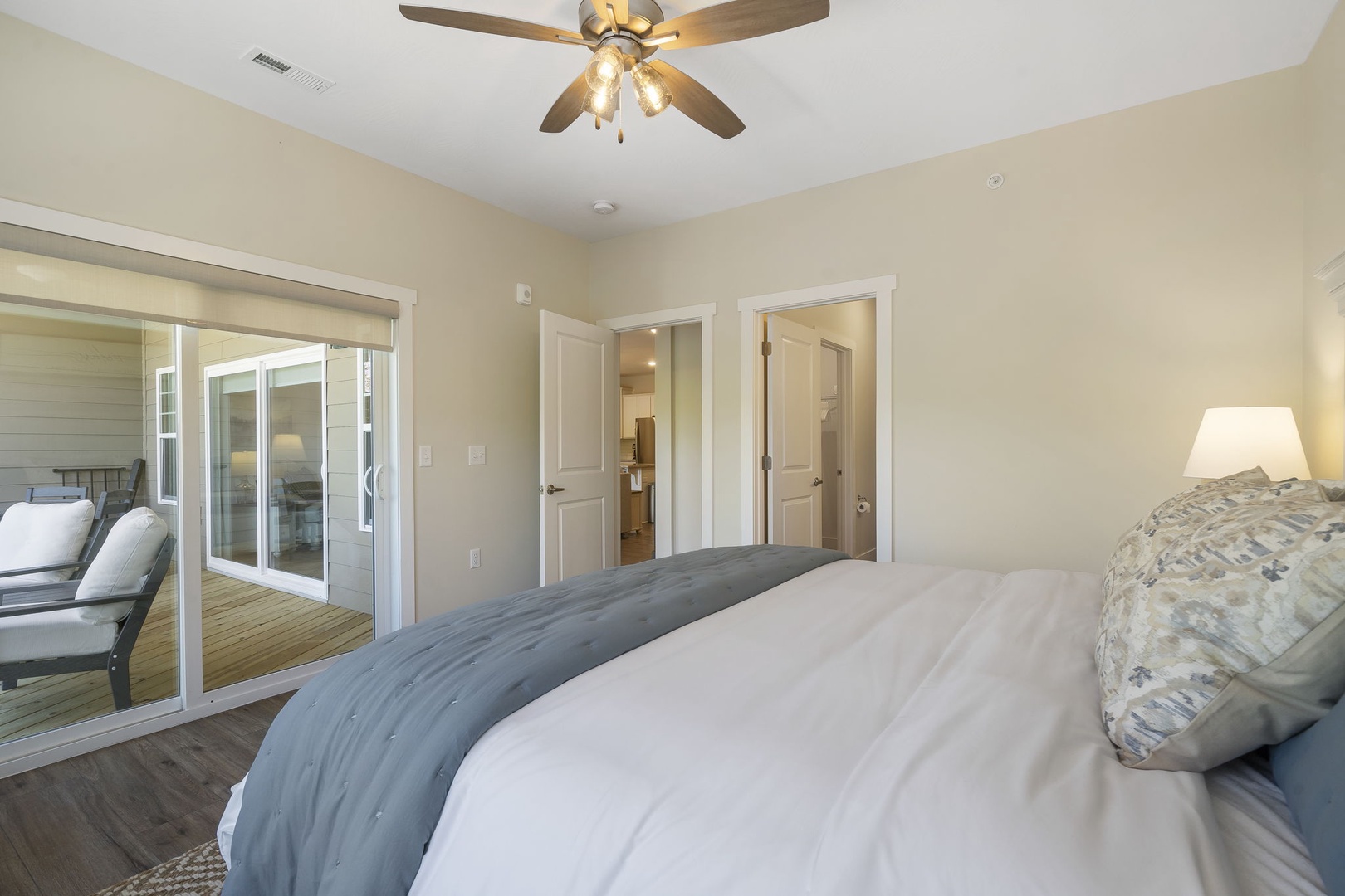 The Master Bedroom offers a King Bed, TV, En Suite Bathroom, and stunning lake views