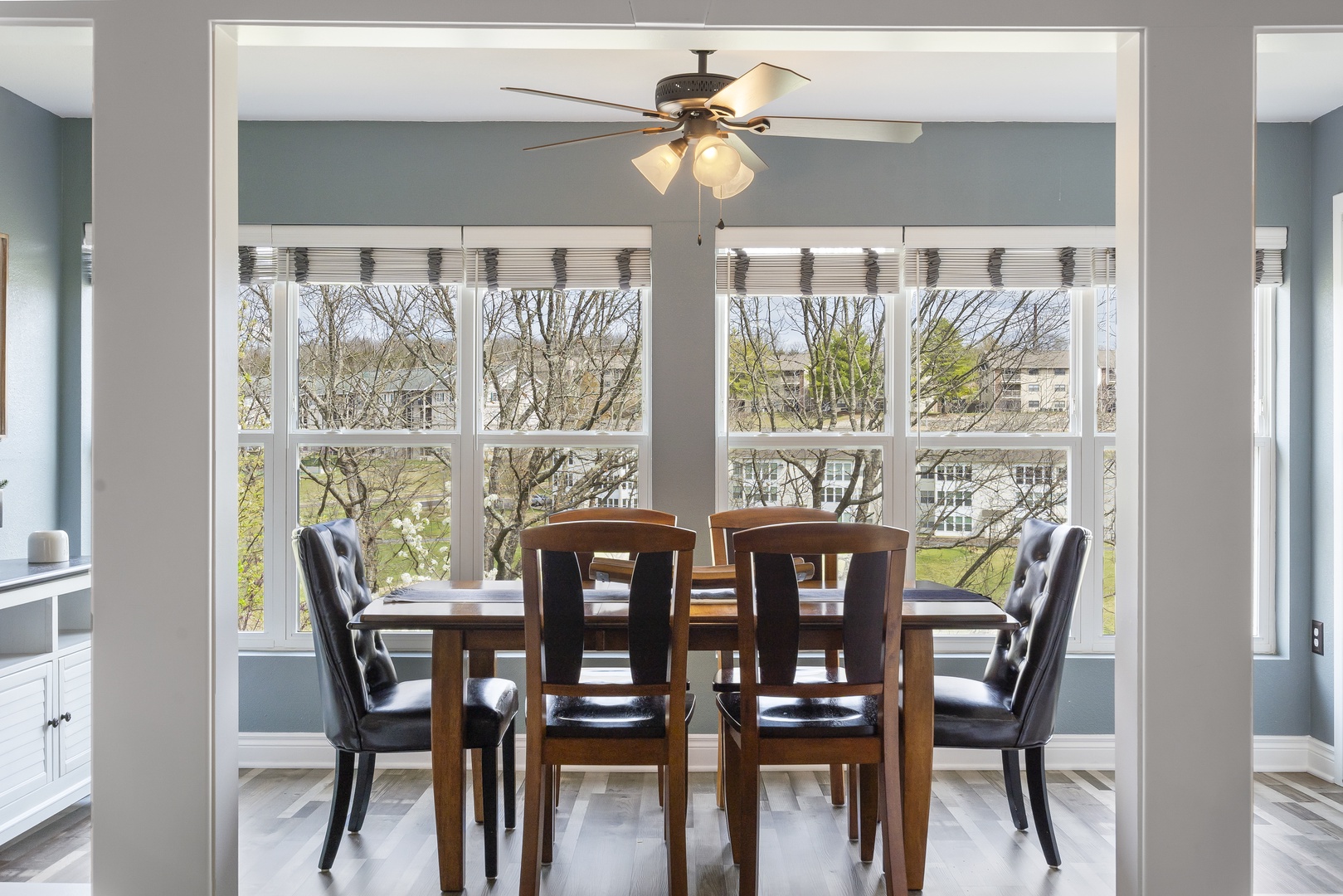 Gather for elegant meals together at the dining table, offering seating for 6