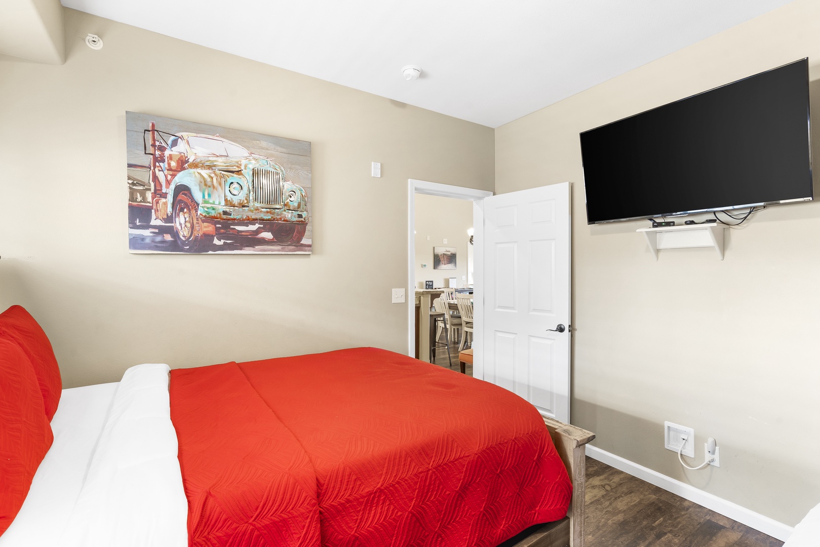 The third bedroom retreat boasts a queen bed, twin-over-full bunks, & a TV
