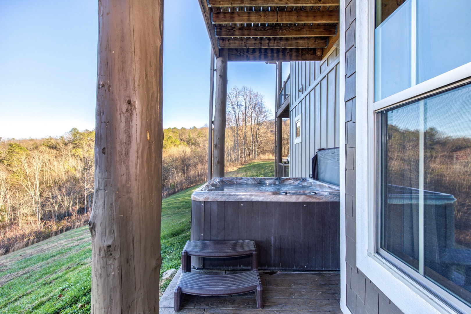 Unwind in the secluded hot tub, enjoying panoramic views all day long