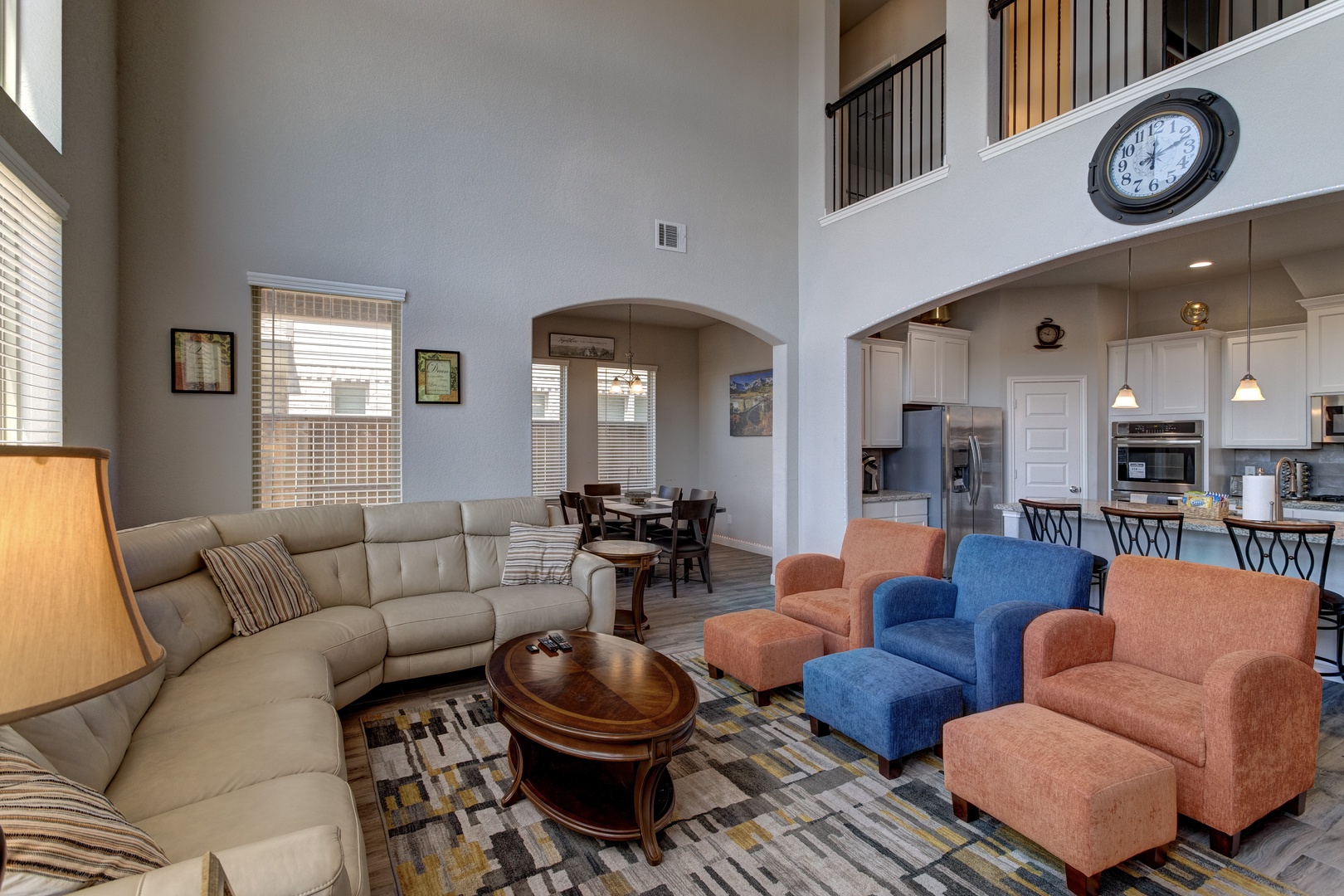 Bright living area with ample seating, fireplace, and Smart TV