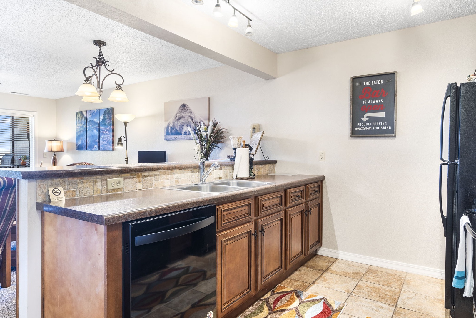 The spacious kitchen offers ample space & all the comforts of home