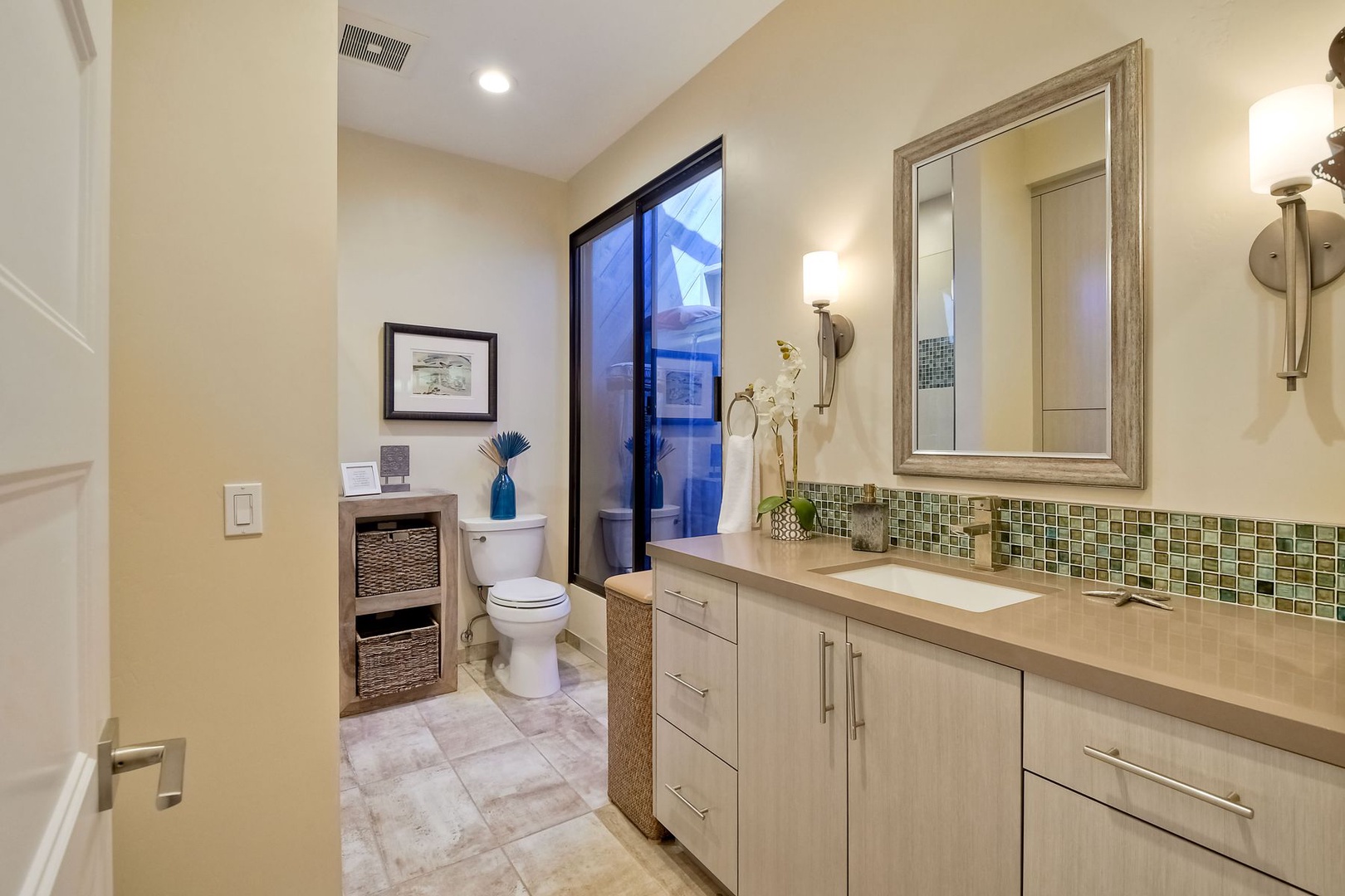 The 2nd floor’s shared full bath offers a large single vanity & shower/tub combo