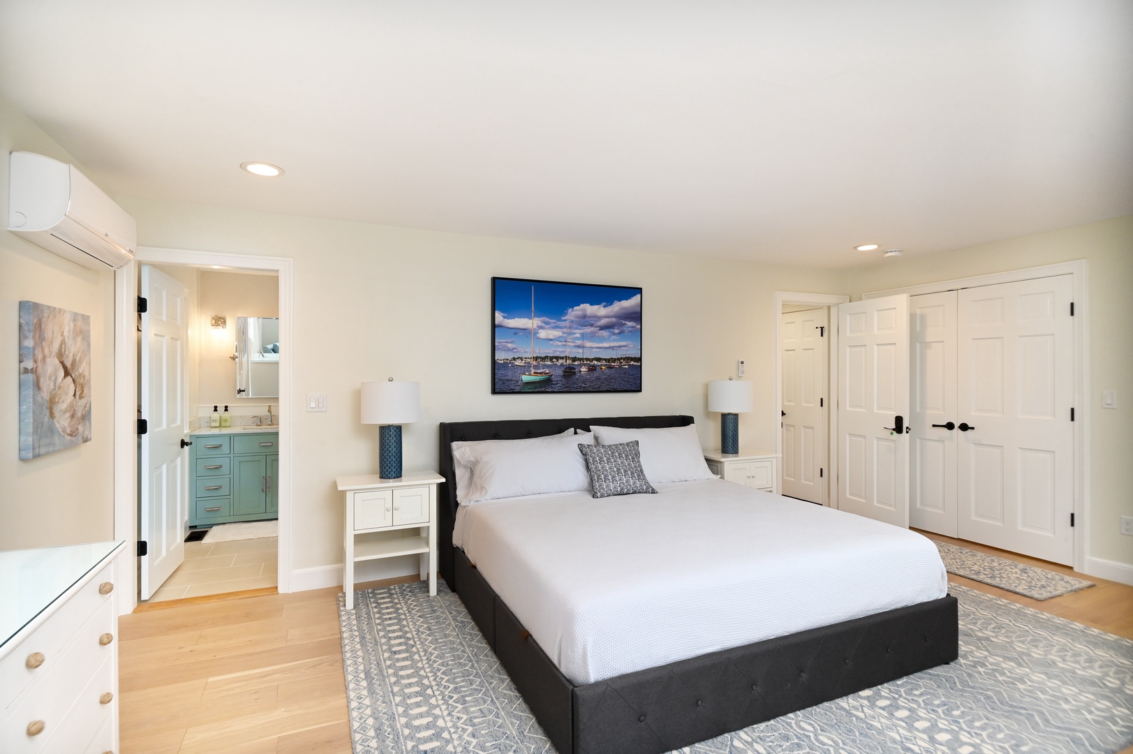 Harbor View’s breezy studio boasts a plush king bed, ensuite, TV, & cozy kitchenette