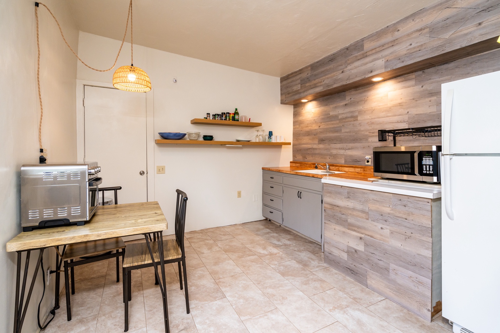 The eat-in kitchen offers a comfortable atmosphere with ample amenities