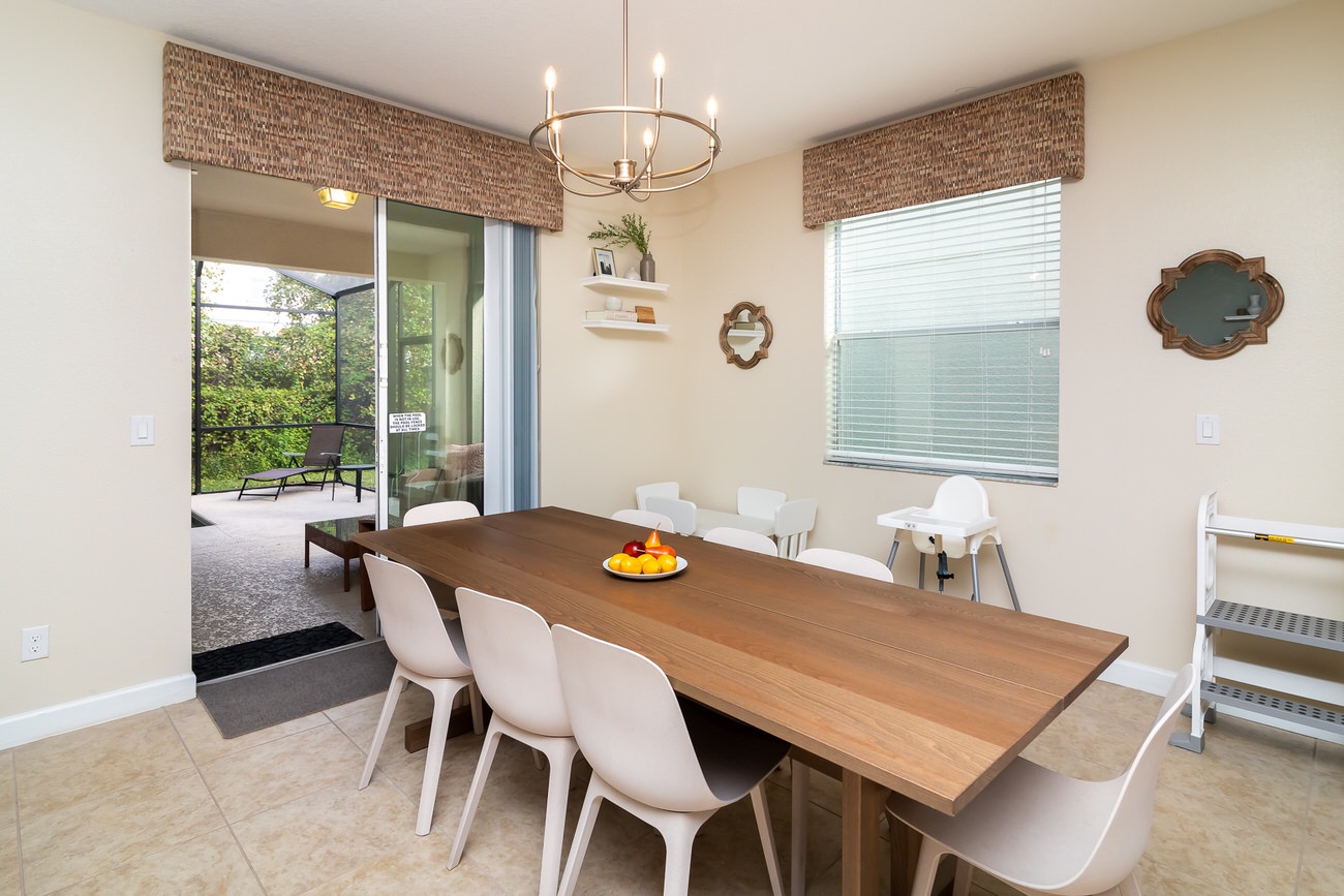 Dining table with seating for 8. Additional seating for toddlers accessible