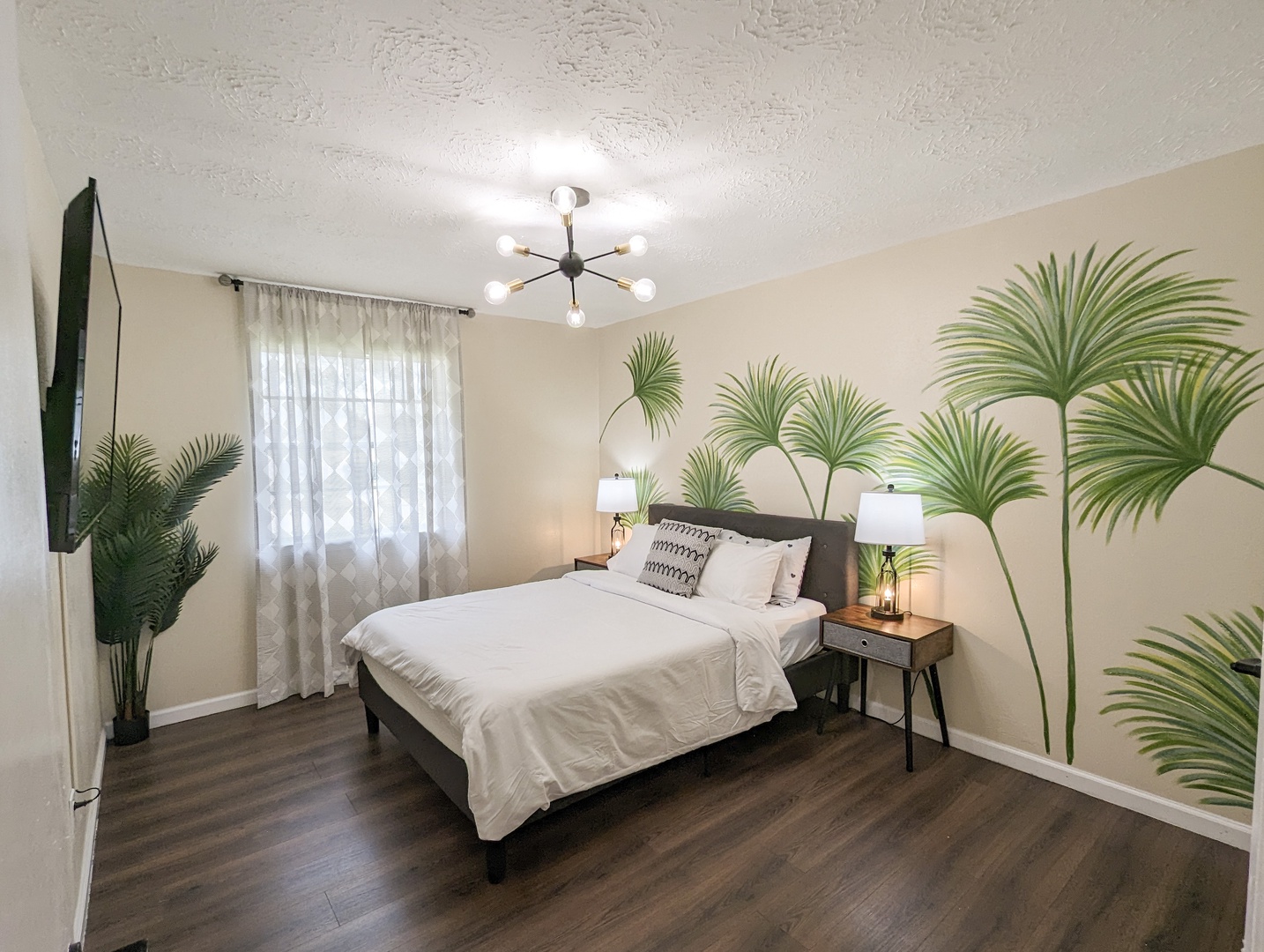 Sway with the palms in the 2nd bedroom, with queen bed & Smart TV