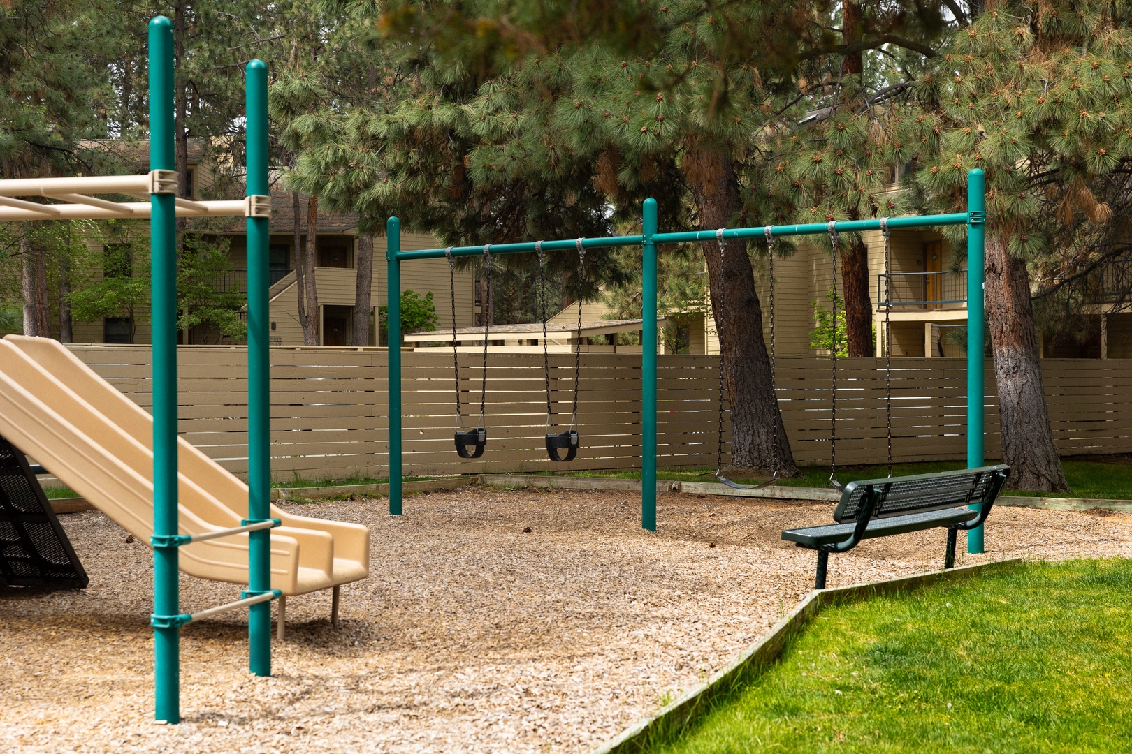 Enjoy a well-maintained playground nestled among the trees