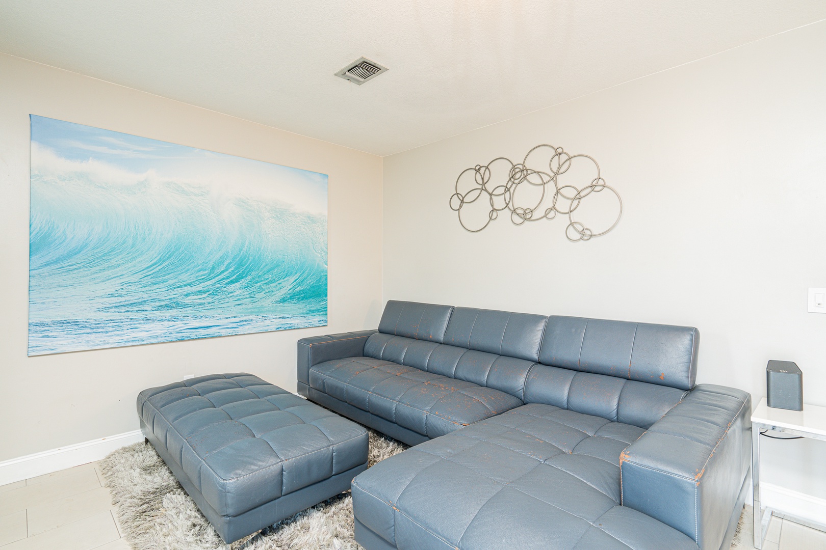 Curl up in the coastal living room & stream all your favorite entertainment