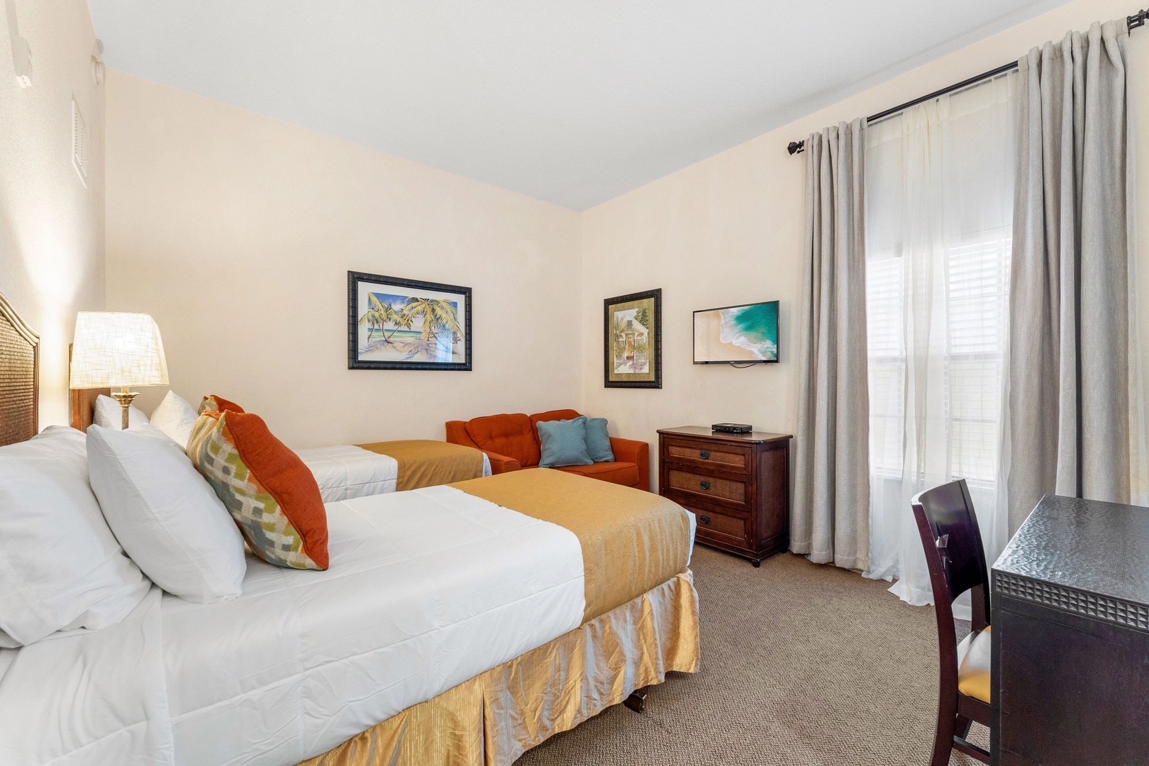 A pair of plush twin beds awaits in the first bedroom retreat with