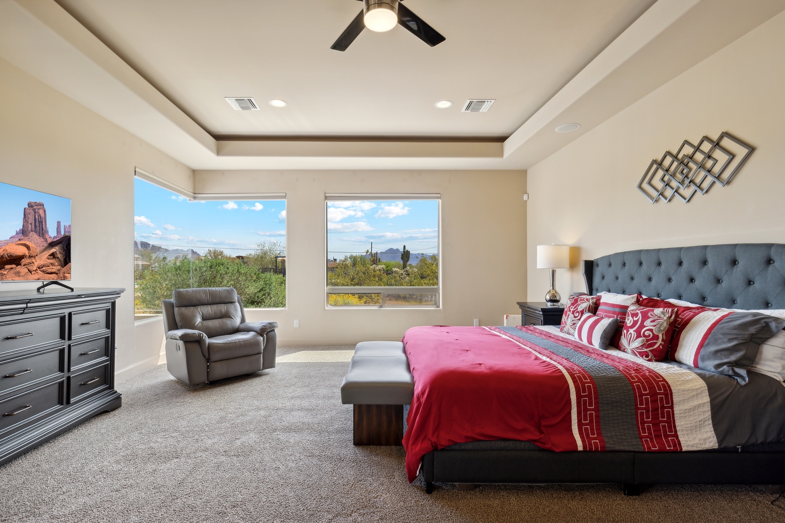 The primary king suite boasts mountain views, a private ensuite, & Smart TV