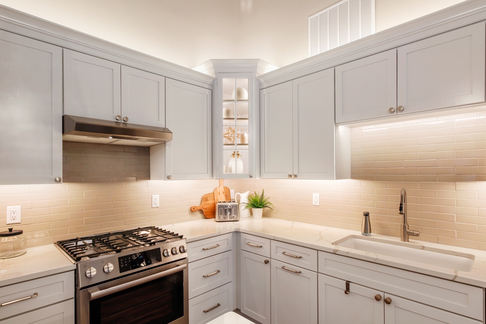 The grand kitchen offers loads of space & all the comforts of home