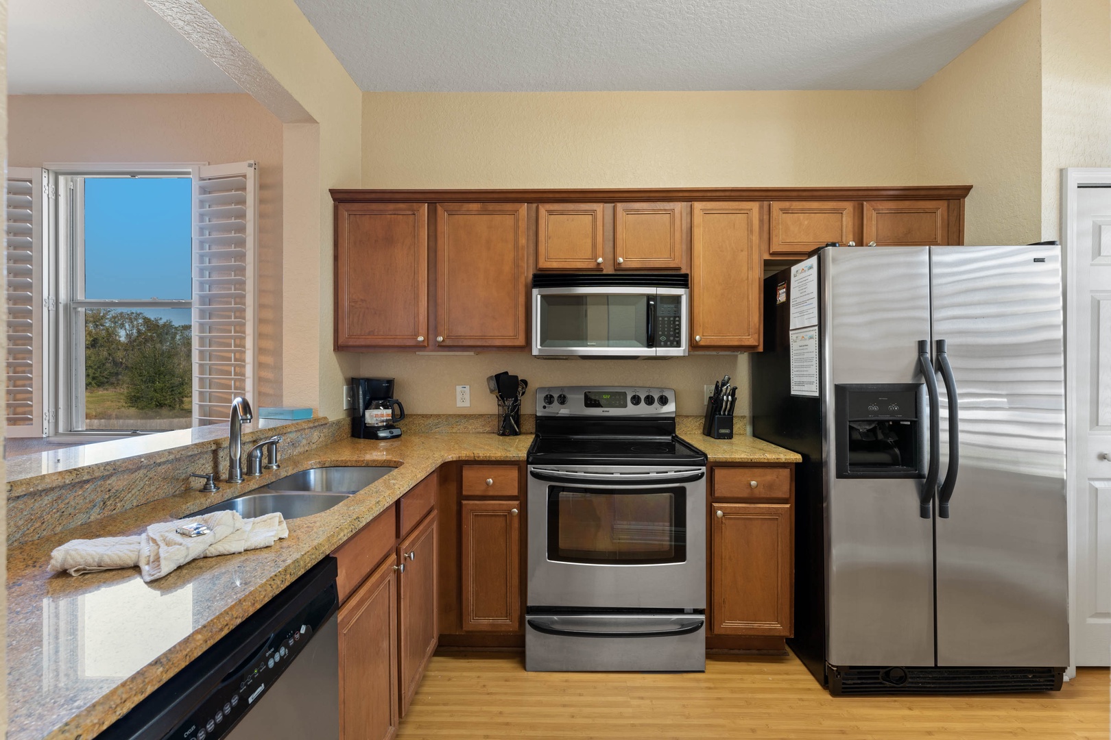 The updated kitchen offers loads of space & all the comforts of home