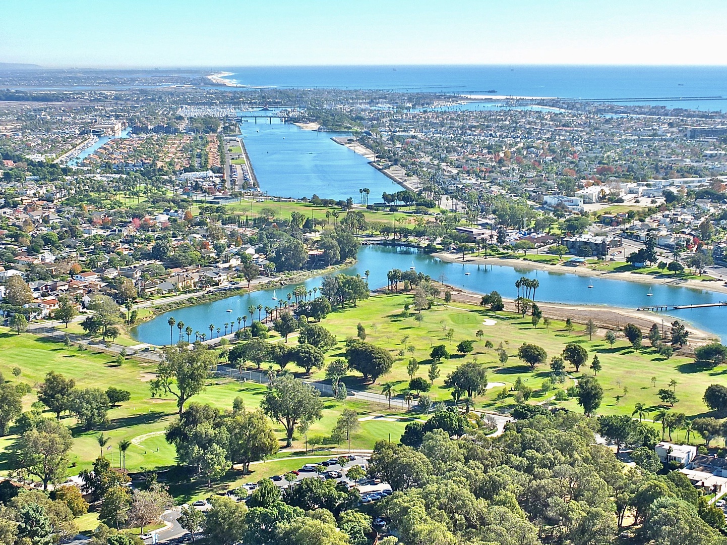 An aerial perspective showcasing the stunning landscape, vibrant community, and serene waterways