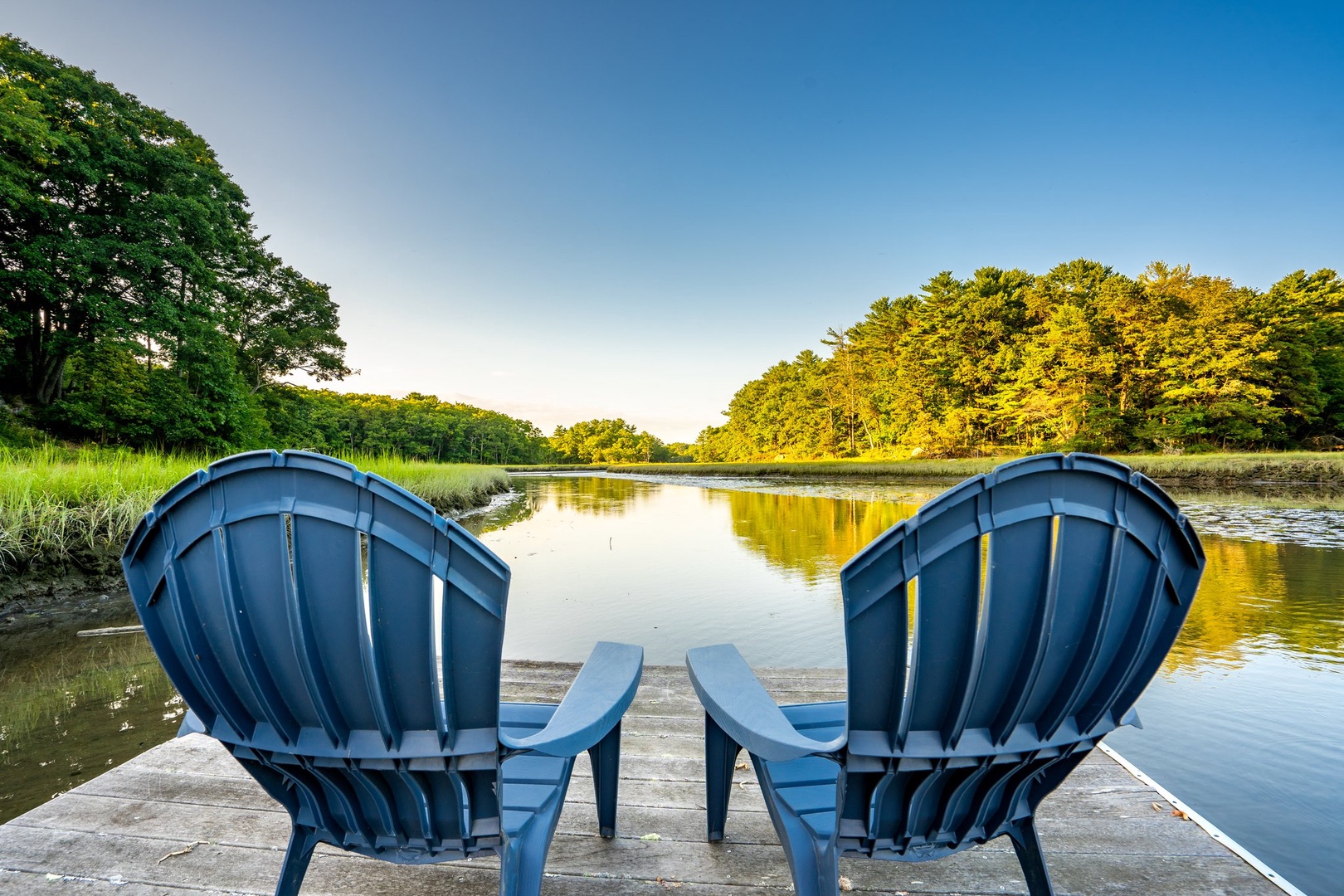 Back yard with outdoor seating and stunning water views