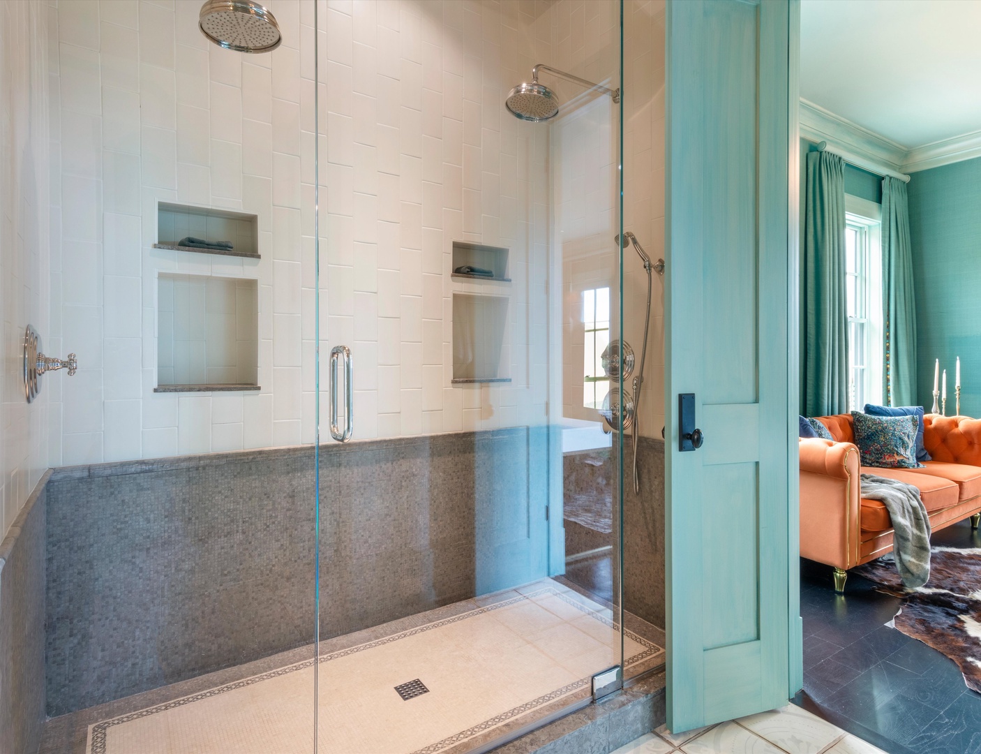 Ensuite bathroom with dual sinks, and large stand-up shower