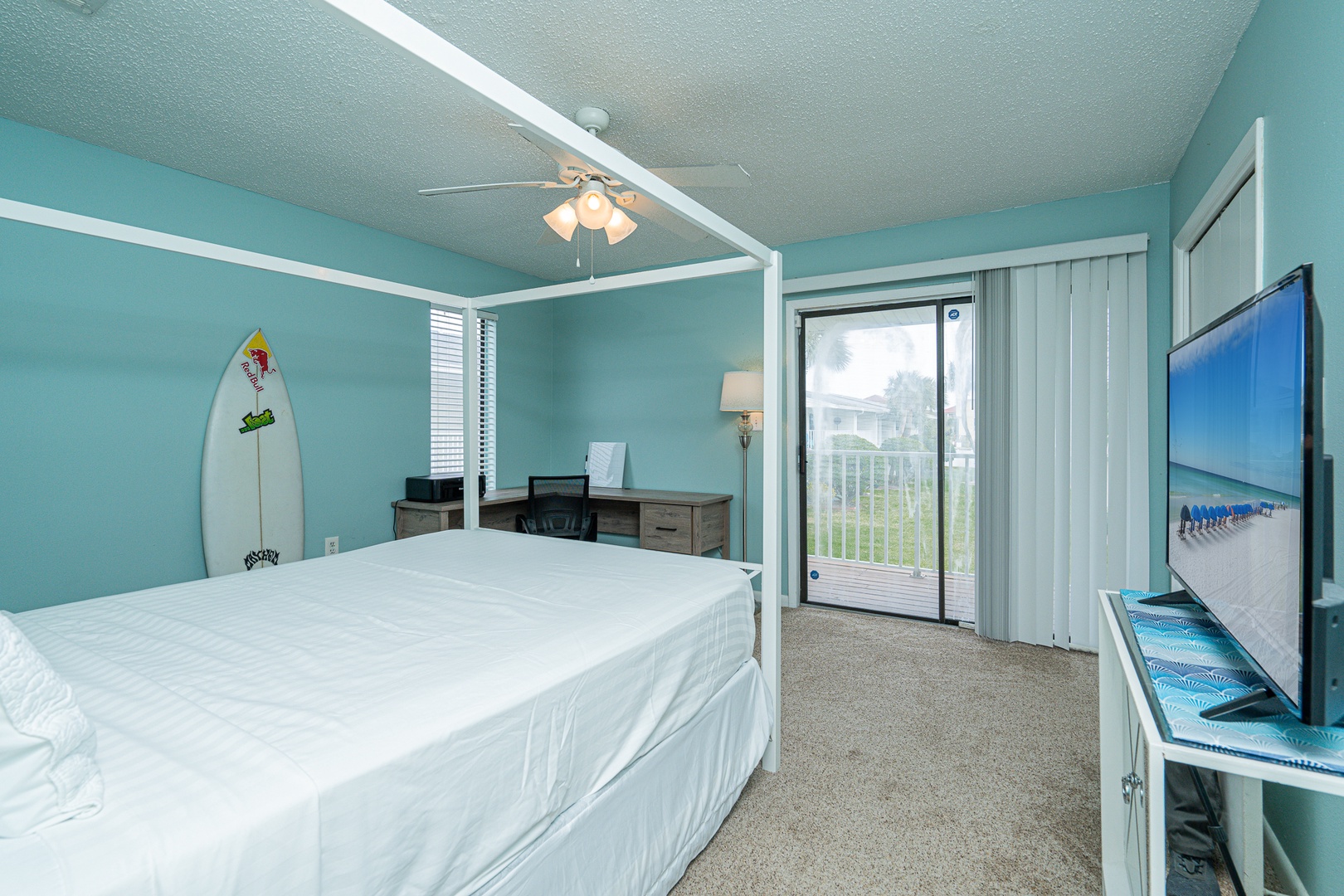 The king suite boasts a private ensuite, desk workspace, Smart TV, & balcony