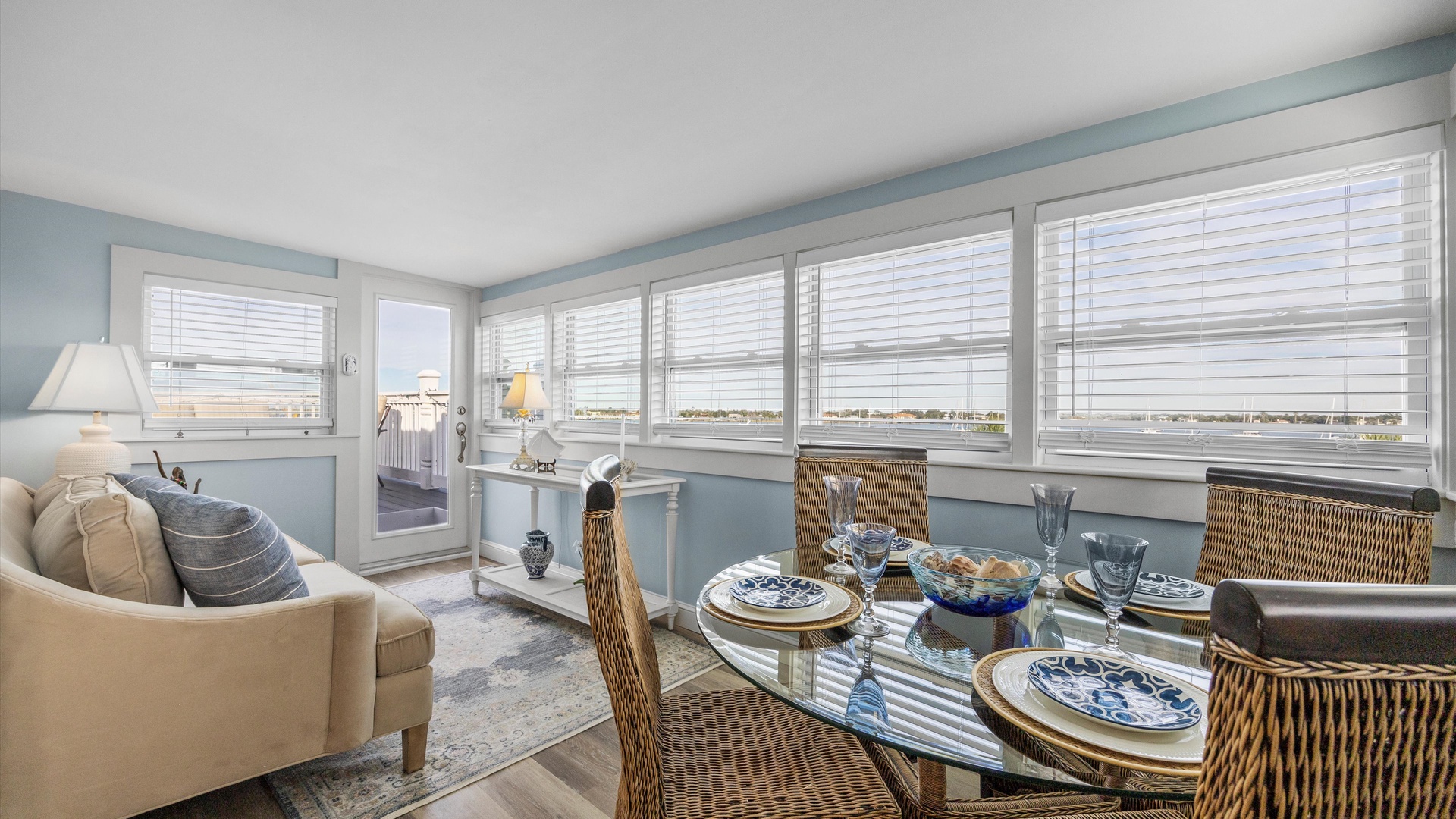 Dine in style or relax with a book in the serene back sunroom