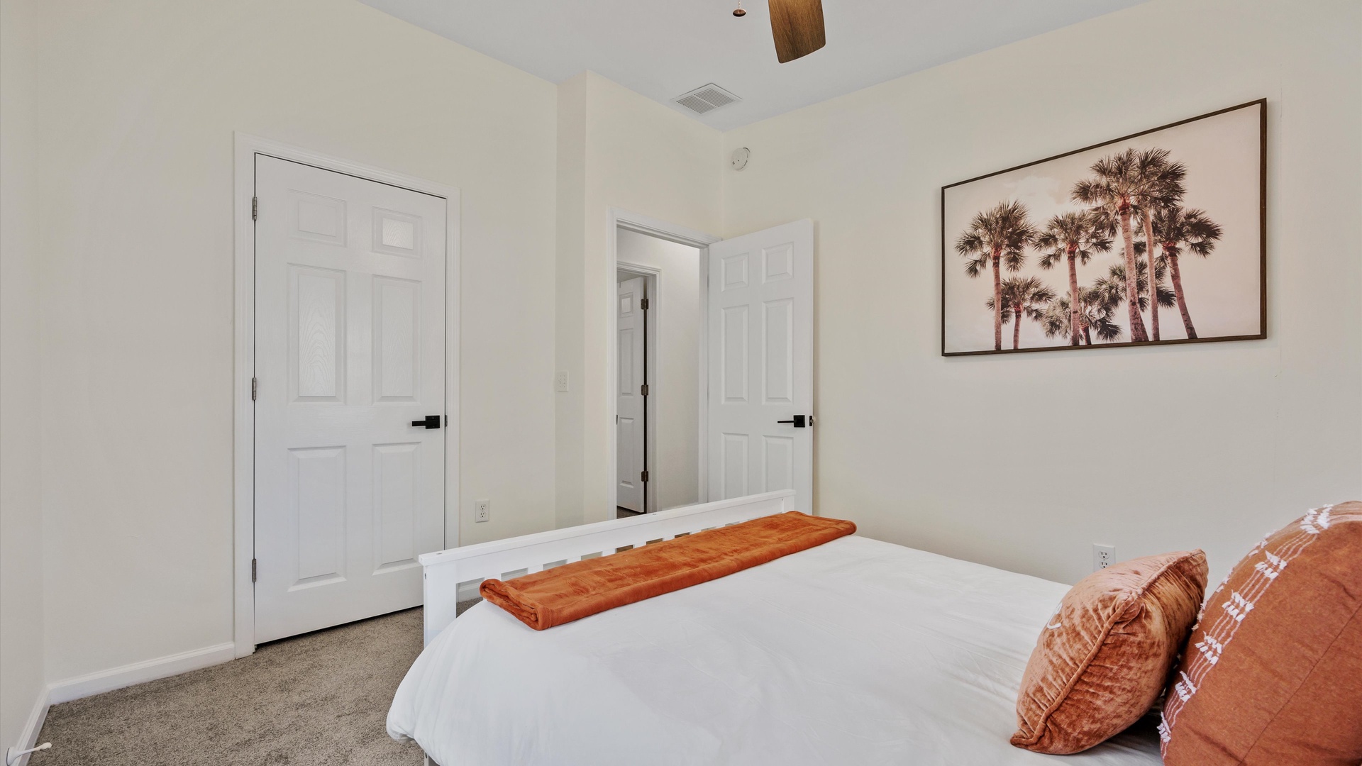 The final bedroom offers a comfy full-sized bed & tranquil views
