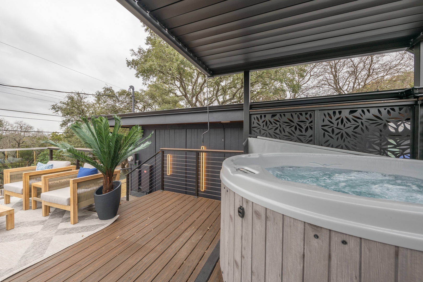 Back deck with outdoor seating & hot tub