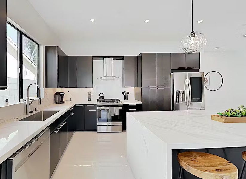 Large gourmet kitchen with stainless upgraded appliances