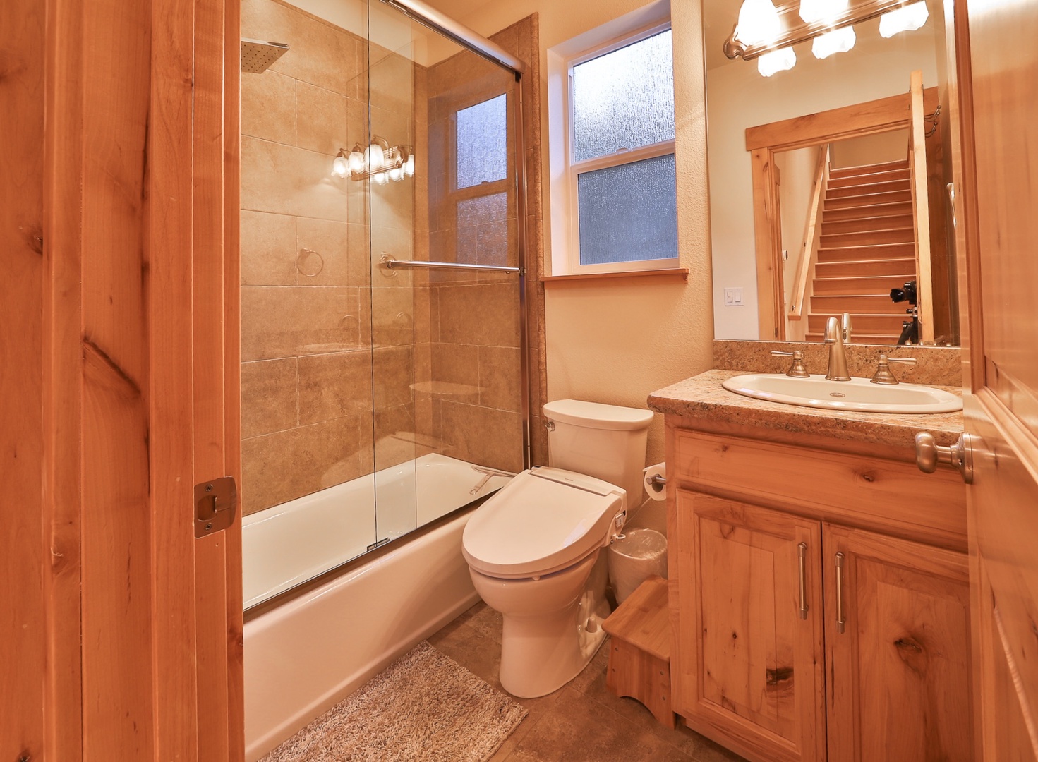 Wash up in this 2nd-floor full bath, with a vanity & shower/tub combo