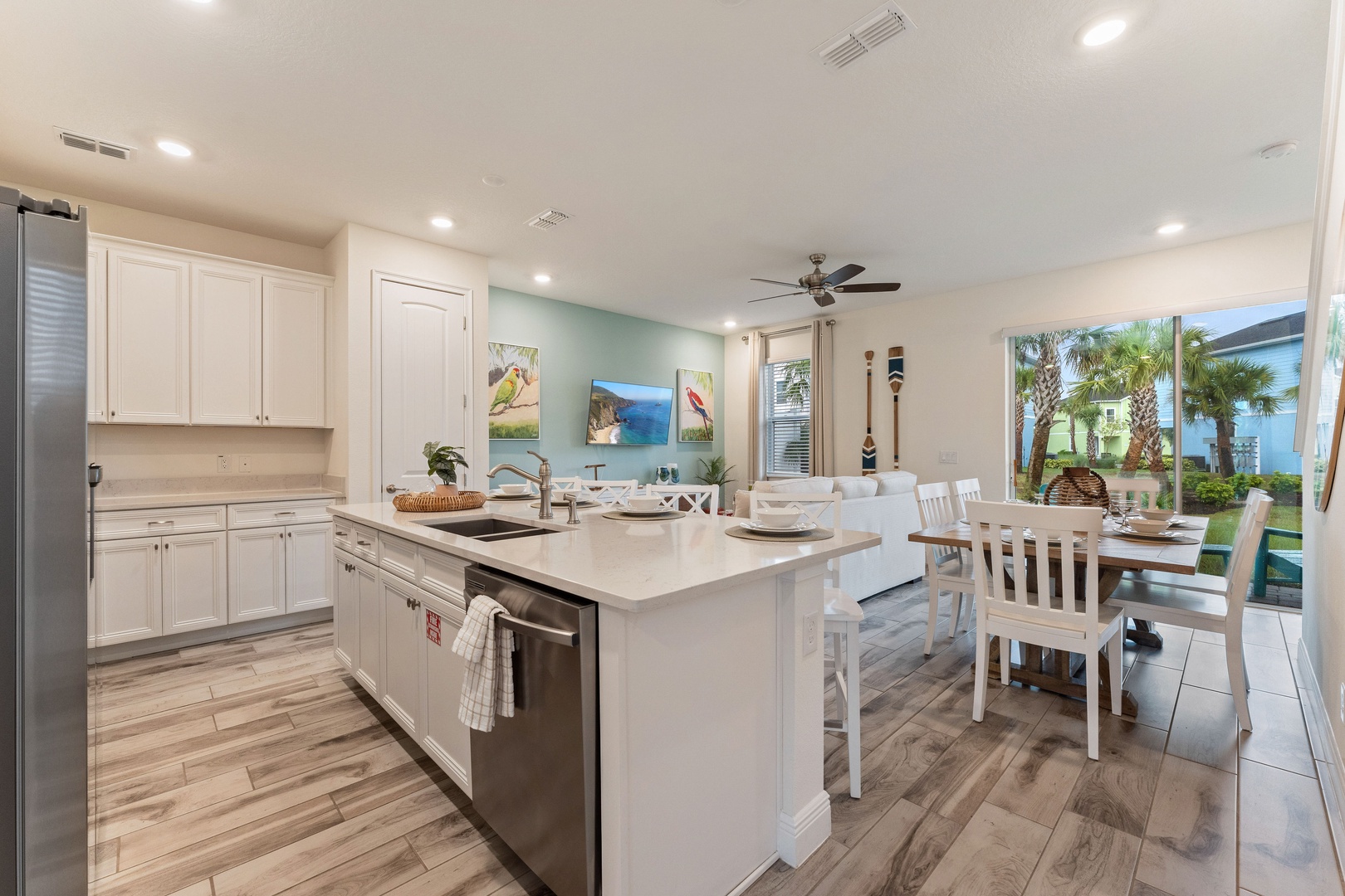 The bright, open kitchen offers ample space & all the comforts of home