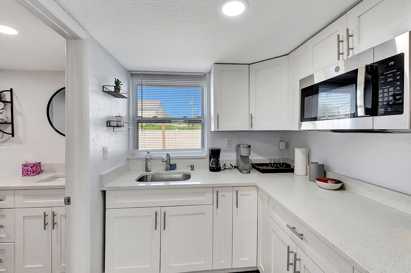 Cottage - The streamlined kitchen is well-equipped for your visit