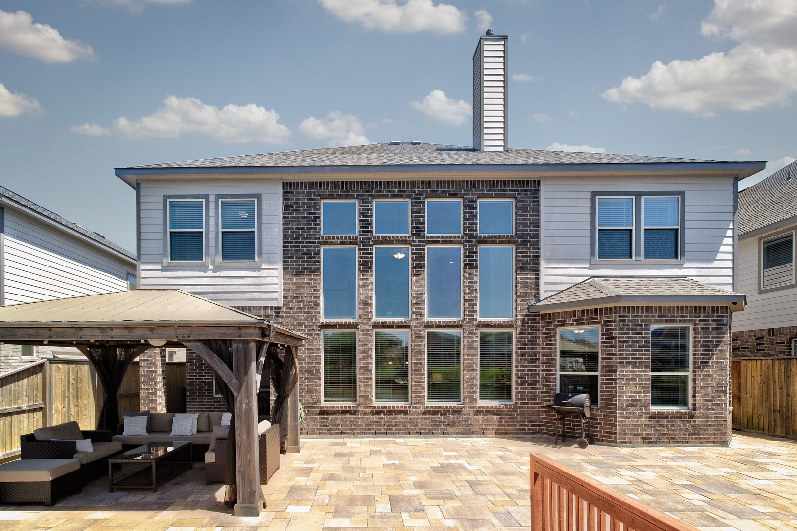 Back patio with covered outdoor seating