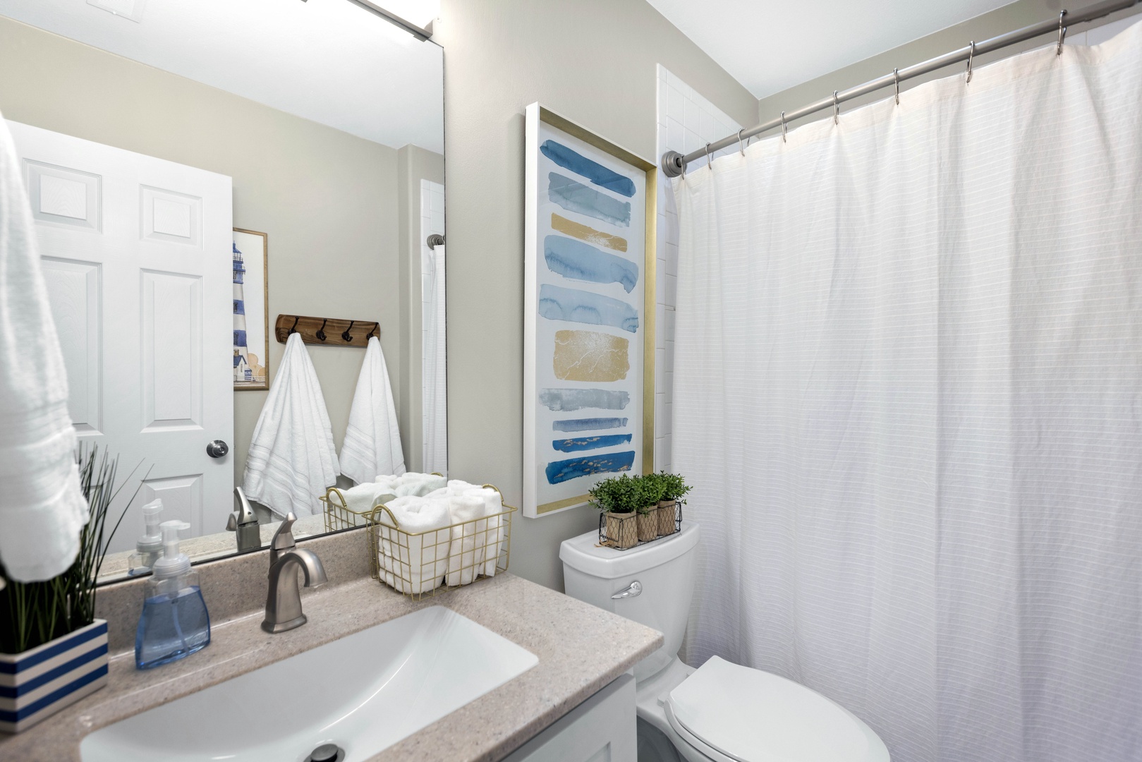 Shared bathroom with shower/tub combo