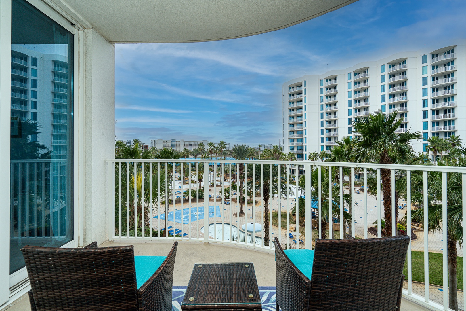 Relax on the balcony and take in the scenic pool views