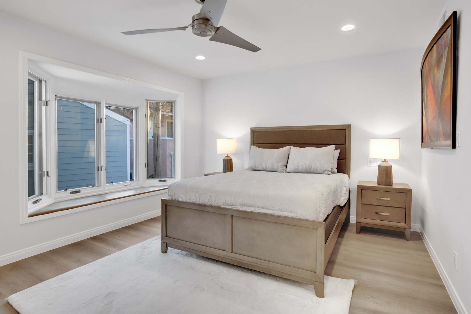 Bedroom 2 with Queen bed, Smart TV, and en-suite