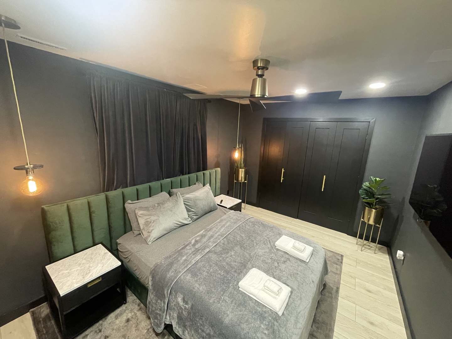 Bedroom 1 with queen bed and Smart TV
