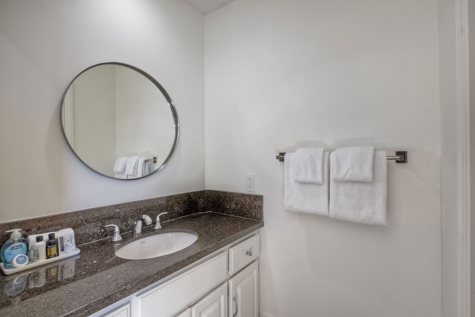 Enjoy dual vanities & a shower/tub combo in the Jack & Jill bathroom