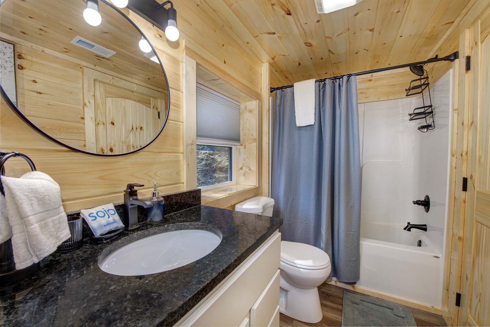 The king ensuite offers a single vanity & shower/tub combo