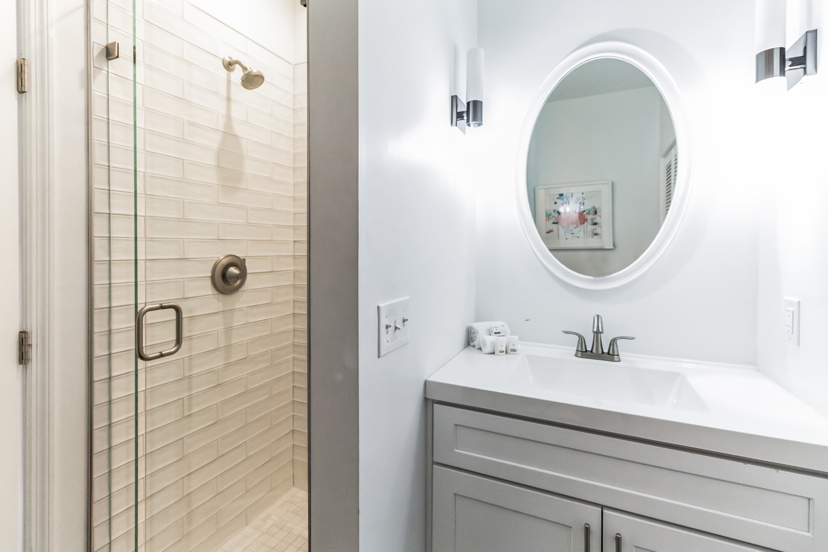 Unit C2: The 1st floor full bathroom offers a single vanity & glass shower