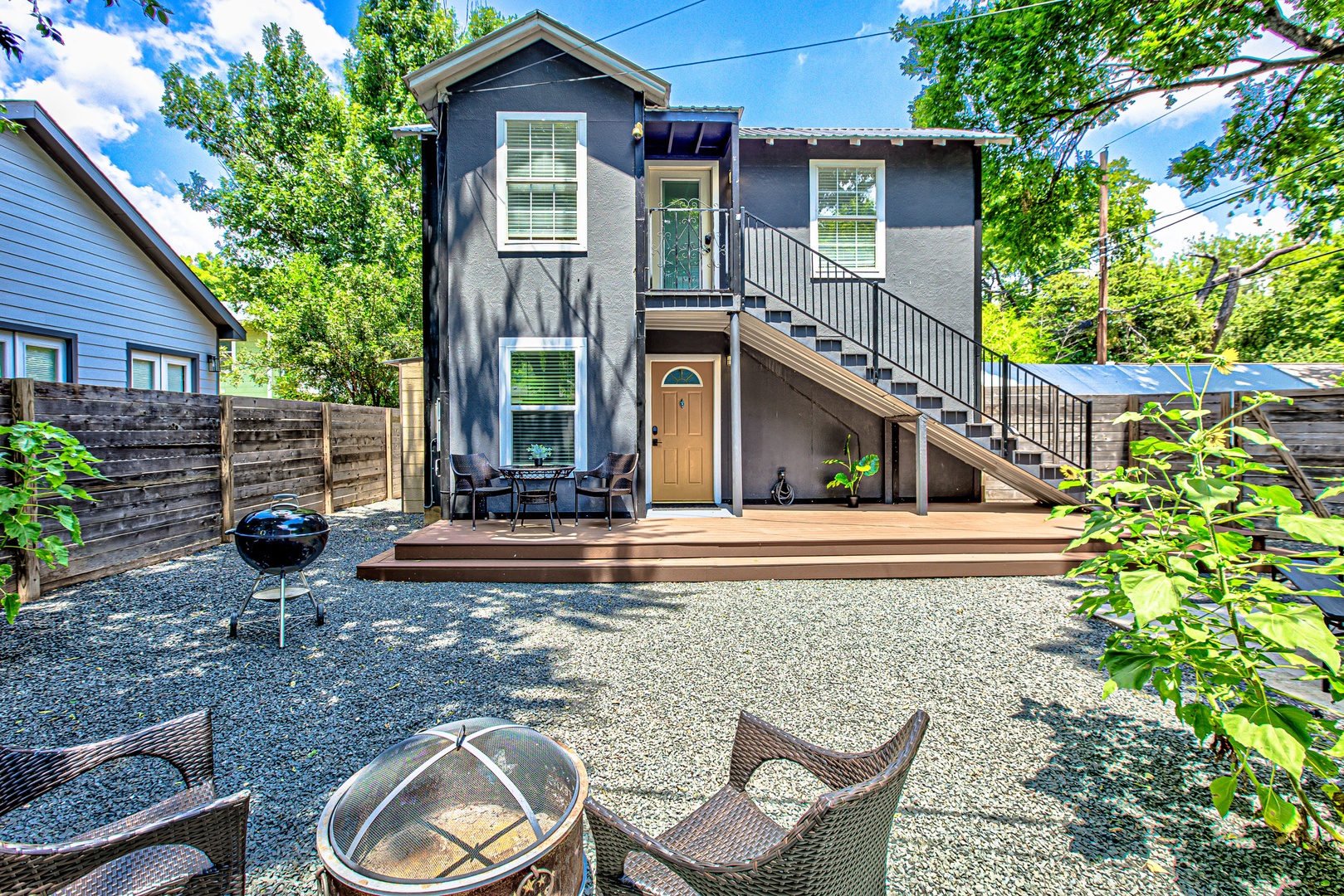 Exterior with fire pit and grill