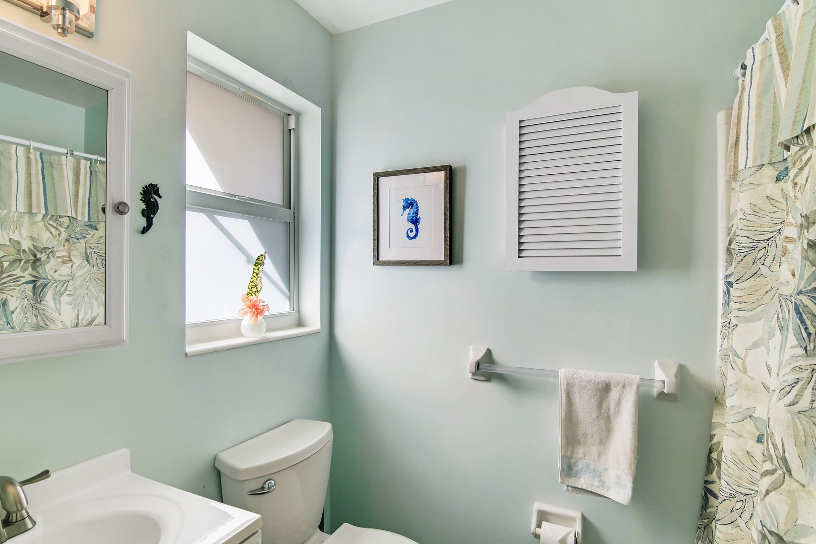 A single vanity & shower/tub combo await in this serene ensuite bathroom
