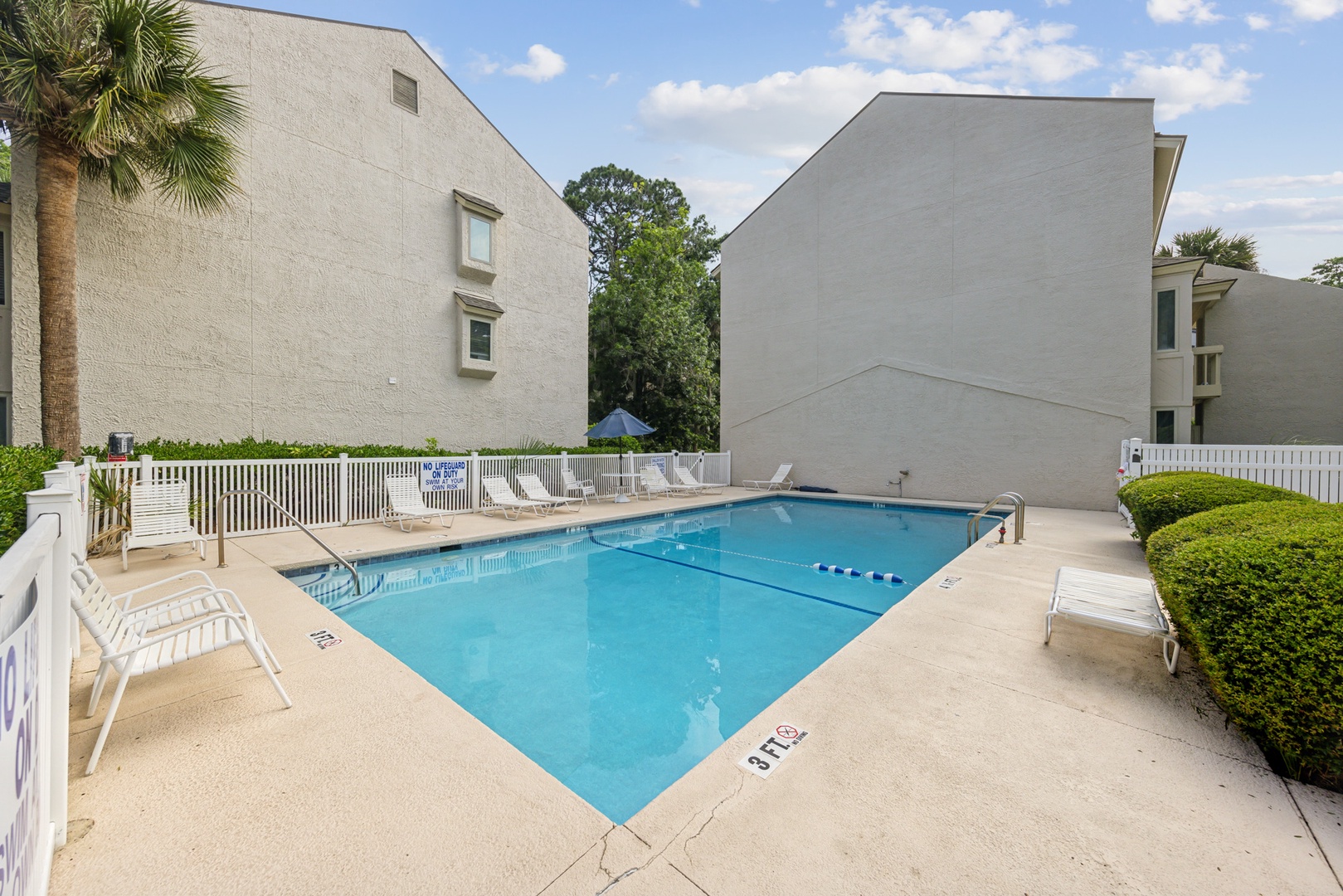 Enjoy an afternoon of relaxation by the communal pool