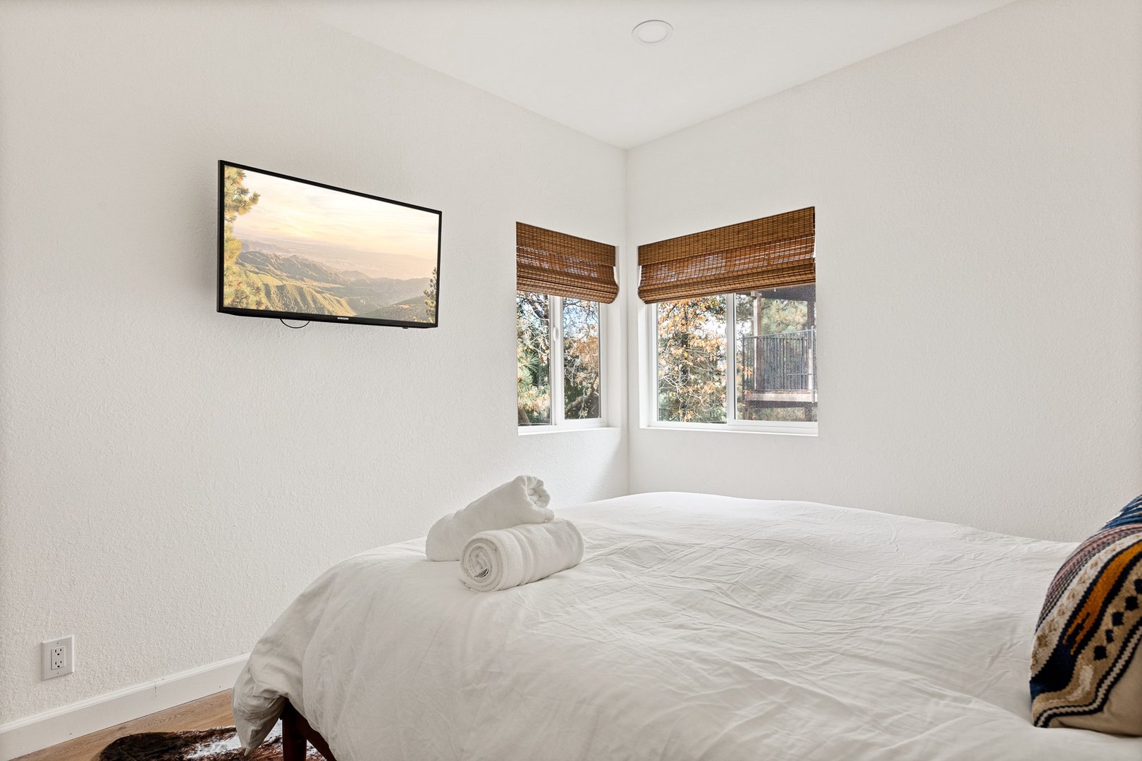 This cozy 1st floor bedroom includes a queen bed & Smart TV