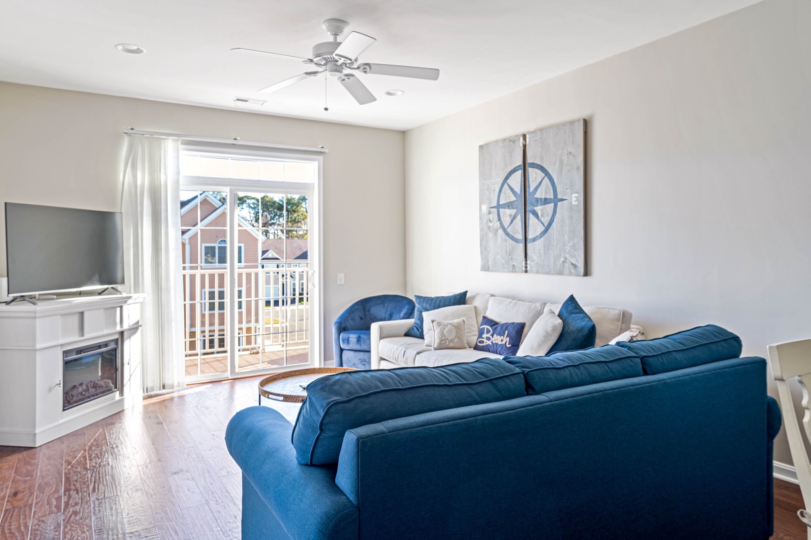 Floor-to-ceiling glass doors in the living area