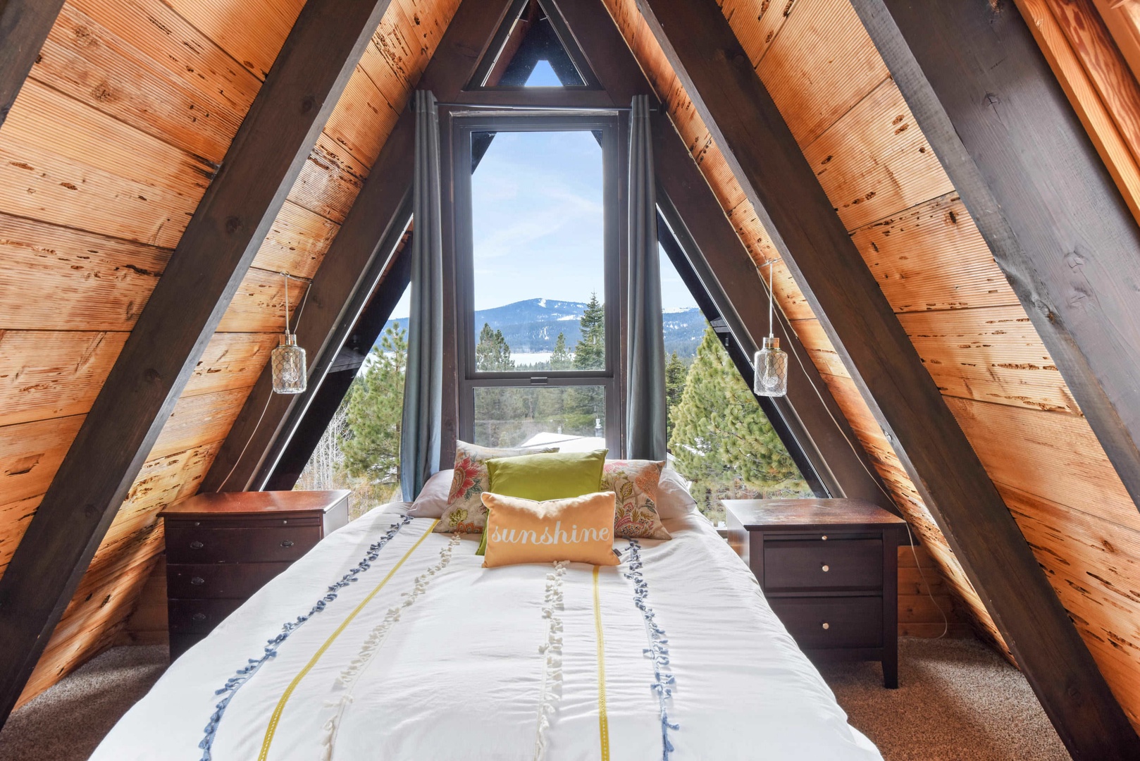 2nd bedroom: Queen bed with mountain and lake views