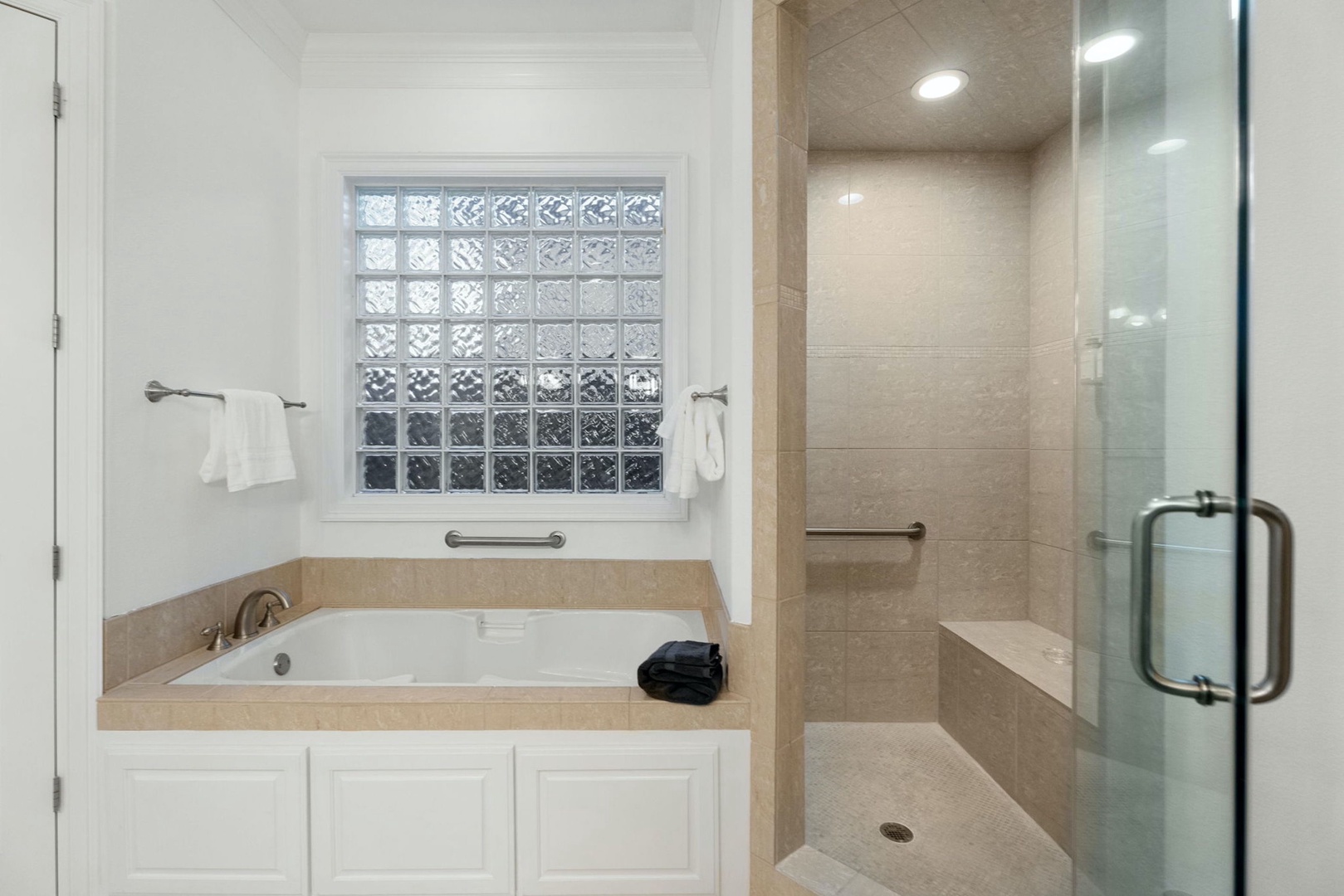 En-suite bathroom with separate shower, and soaking tub