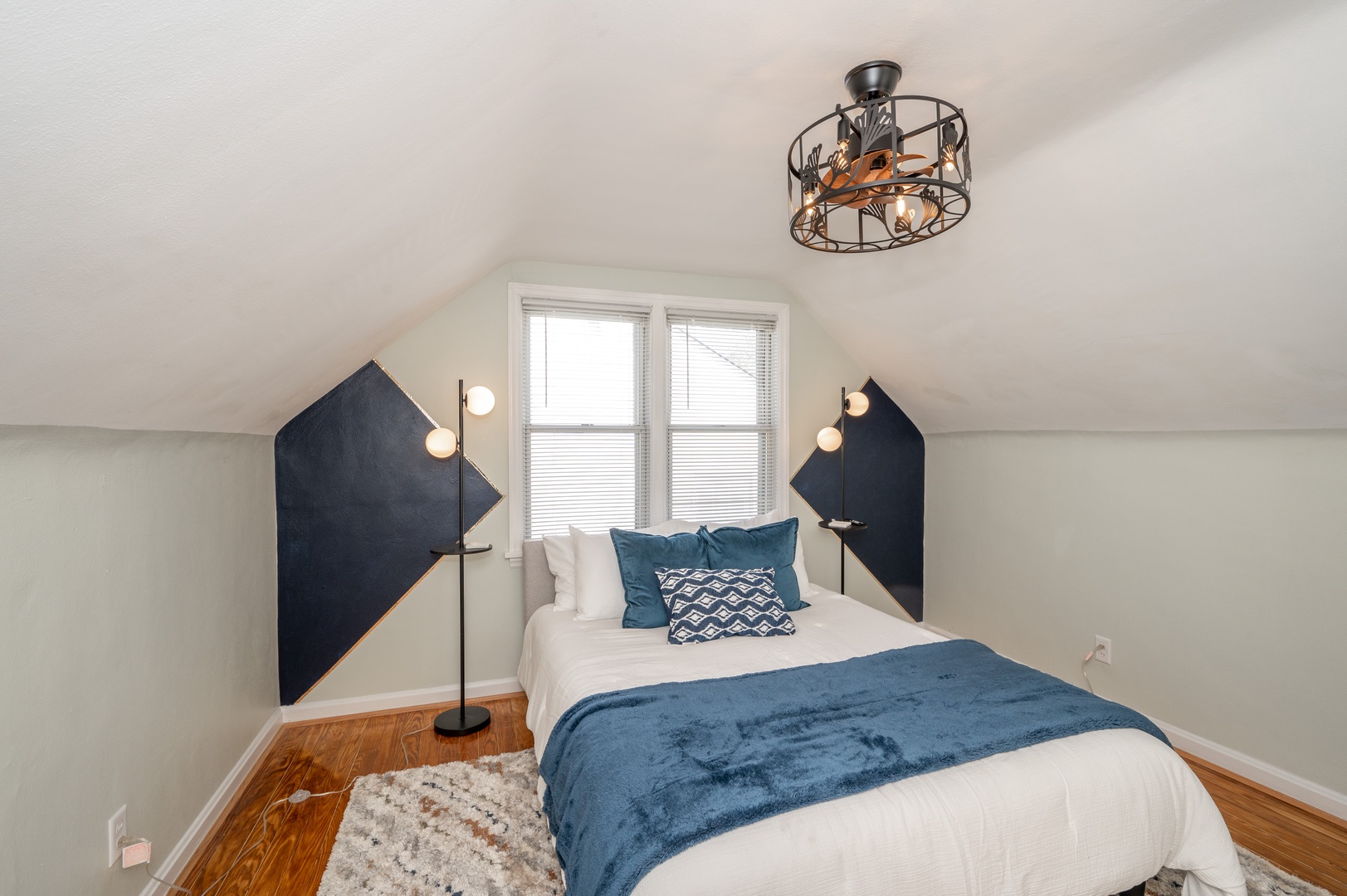 Sneak away to this tranquil 2nd Floor Queen Bedroom with Ceiling Fan