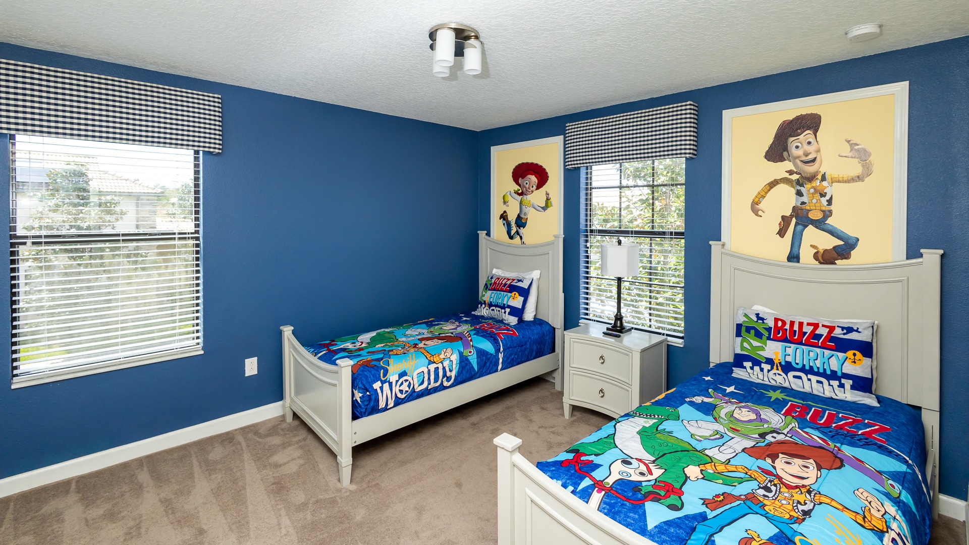 Bedroom 5 Toy Story themed with 2 twin beds, and Smart TV