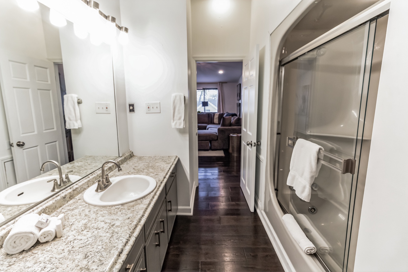 Unit C2: The 2nd floor full bathroom includes a large vanity & shower/tub combo