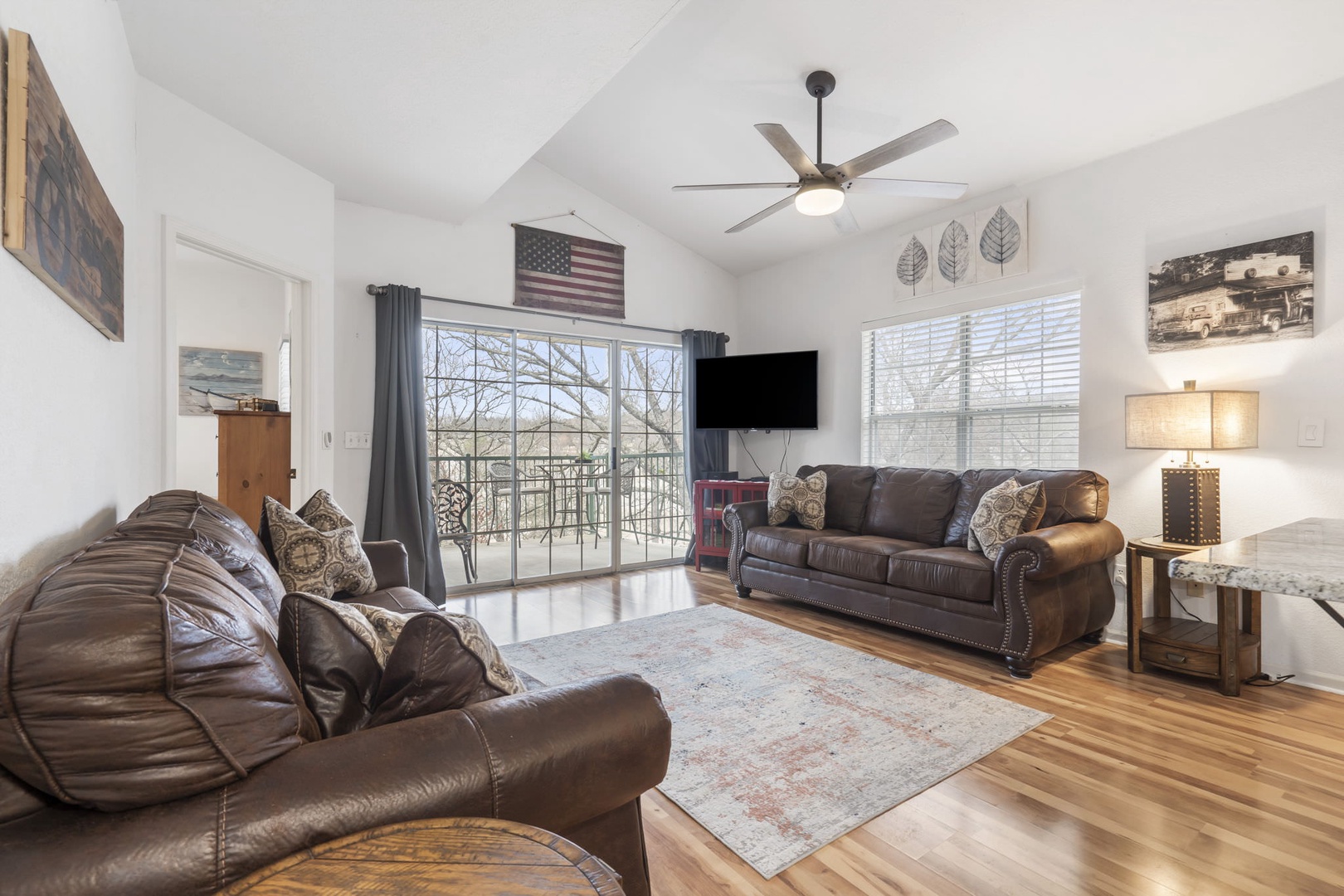 Floor-to-ceiling glass windows in the living area